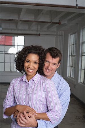 simsearch:700-00515289,k - Portrait of Couple in Empty Loft Apartment Foto de stock - Sin royalties Premium, Código: 600-01037465