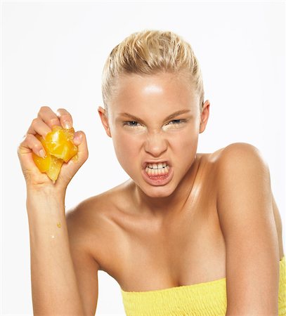 single lemon - Portrait of Woman Stock Photo - Premium Royalty-Free, Code: 600-01037529