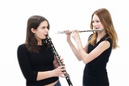 simsearch:640-01365707,k - Teenage Girls Playing Flute and Clarinet Stock Photo - Premium Royalty-Free, Code: 600-01037654
