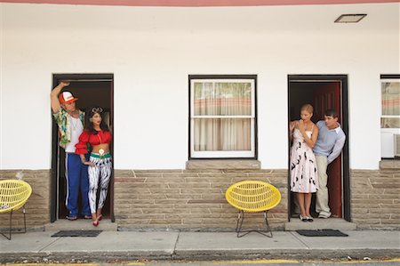 simsearch:700-00796323,k - Two Couples in Motel Looking at Each Other Stock Photo - Premium Royalty-Free, Code: 600-01041479