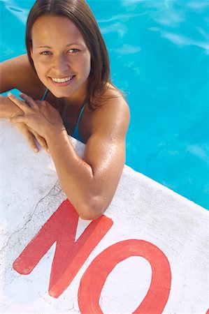 simsearch:600-01041609,k - Woman in Swimming Pool Stock Photo - Premium Royalty-Free, Code: 600-01041627