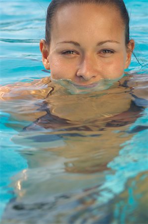 simsearch:600-01041609,k - Woman in Swimming Pool Stock Photo - Premium Royalty-Free, Code: 600-01041718