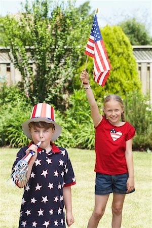 simsearch:700-00092986,k - Portrait of Boy Wearing Stars and Stripes Top and Hat, Girl Holding American Flag Stock Photo - Premium Royalty-Free, Code: 600-01042004