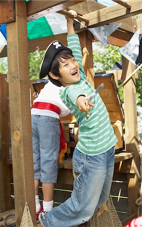 simsearch:600-00824351,k - Portrait of Boy Pretending to be a Pirate Stock Photo - Premium Royalty-Free, Code: 600-01042031
