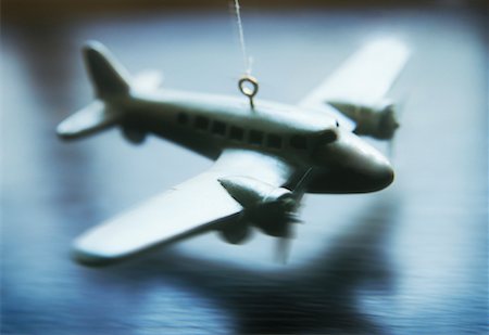 shadow plane - Toy Airplane Stock Photo - Premium Royalty-Free, Code: 600-01042924