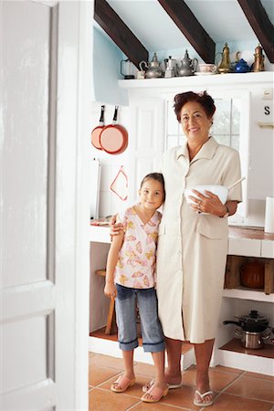 simsearch:600-01043390,k - Grandmother and Granddaughter in Kitchen Stock Photo - Premium Royalty-Free, Code: 600-01043333