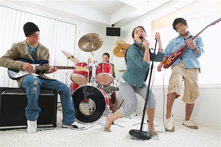 simsearch:640-01365707,k - Band Playing in Living Room Stock Photo - Premium Royalty-Free, Code: 600-01072208