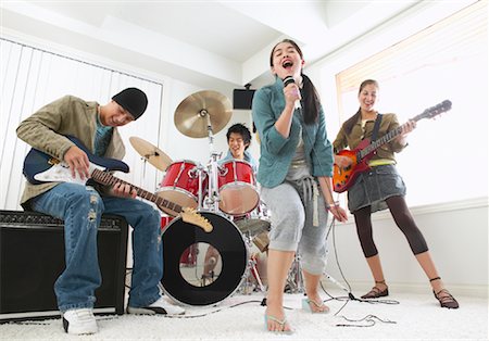simsearch:600-01072271,k - Band Playing in Living Room Stock Photo - Premium Royalty-Free, Code: 600-01072210