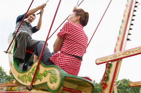 swing old couple - Couple Riding Swingboats, Carters Steam Fair, England Stock Photo - Premium Royalty-Free, Code: 600-01072581