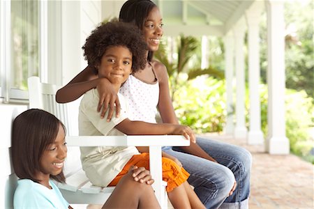 simsearch:700-02671245,k - Family Sitting Outdoors Stock Photo - Premium Royalty-Free, Code: 600-01072823