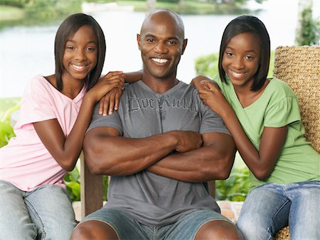 Portrait of Father and Daughters Stock Photo - Premium Royalty-Free, Code: 600-01072850