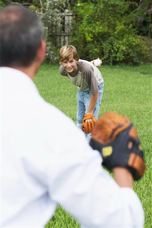 simsearch:600-01073545,k - Father and Son Playing Catch Stock Photo - Premium Royalty-Free, Code: 600-01072876