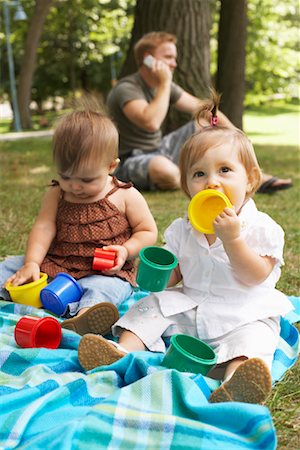 simsearch:600-01172751,k - Babies Sitting on Blanket in Park Stock Photo - Premium Royalty-Free, Code: 600-01073144