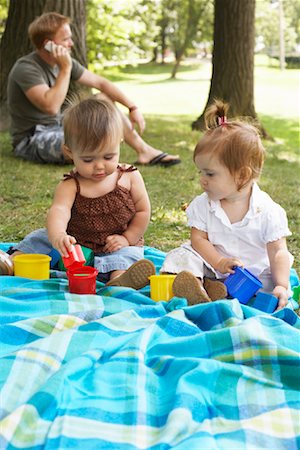 simsearch:600-01172751,k - Babies Sitting on Blanket in Park Stock Photo - Premium Royalty-Free, Code: 600-01073143