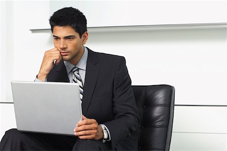 Businessman Using Laptop Computer Stock Photo - Premium Royalty-Free, Code: 600-01073194