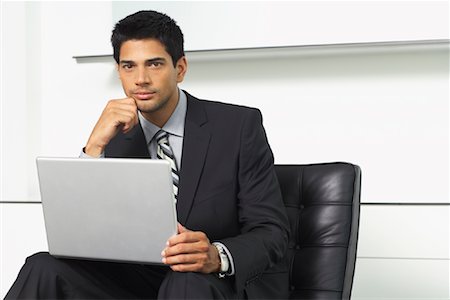 Businessman Using Laptop Computer Stock Photo - Premium Royalty-Free, Code: 600-01073195