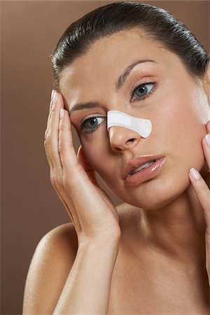 simsearch:700-01073337,k - Portrait of Woman with Bandage On Nose Stock Photo - Premium Royalty-Free, Code: 600-01073371