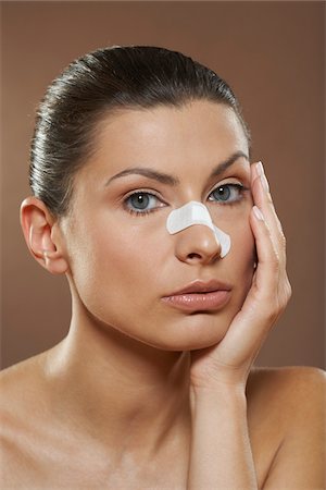 simsearch:700-01073337,k - Portrait of Woman with Bandage on Nose Stock Photo - Premium Royalty-Free, Code: 600-01073373