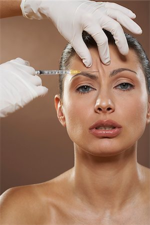 simsearch:700-01073337,k - Woman Getting Botox Injection Stock Photo - Premium Royalty-Free, Code: 600-01073381