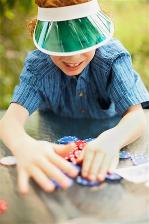 simsearch:600-01073505,k - Boy with Poker Chips Foto de stock - Sin royalties Premium, Código: 600-01073516