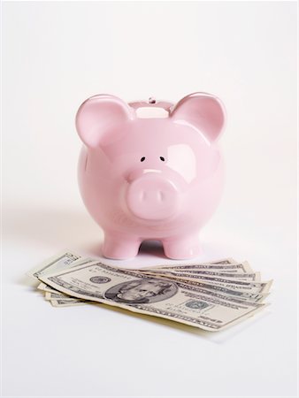 simsearch:600-02797971,k - Piggy Bank and Cash Stock Photo - Premium Royalty-Free, Code: 600-01073556