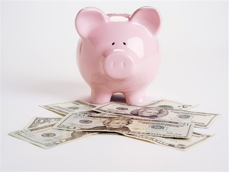 simsearch:600-02797971,k - Piggy Bank and Cash Stock Photo - Premium Royalty-Free, Code: 600-01073557
