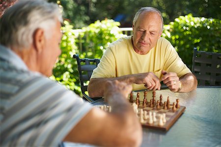 simsearch:600-01073545,k - Men Playing Chess Stock Photo - Premium Royalty-Free, Code: 600-01073550