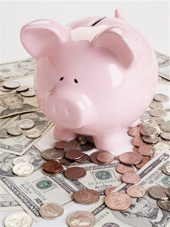 simsearch:600-02797971,k - Piggy Bank and Cash Stock Photo - Premium Royalty-Free, Code: 600-01073560