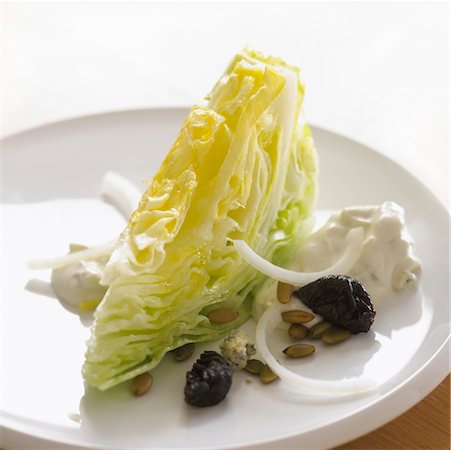 simsearch:700-01099893,k - Iceberg Lettuce Blue Cheese Salad Stock Photo - Premium Royalty-Free, Code: 600-01083400