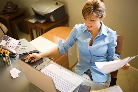 simsearch:700-00641415,k - Woman Working in Home Office Stock Photo - Premium Royalty-Free, Code: 600-01083445