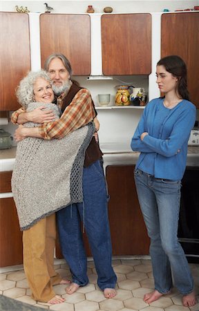 simsearch:600-01717666,k - Mature Family in Kitchen Stock Photo - Premium Royalty-Free, Code: 600-01083706