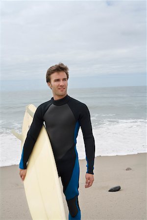 simsearch:400-03992760,k - Man Holding Surfboard Stock Photo - Premium Royalty-Free, Code: 600-01099695