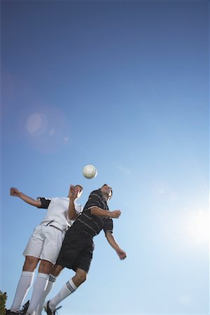 simsearch:700-00048630,k - Men Playing Soccer Stock Photo - Premium Royalty-Free, Code: 600-01109727