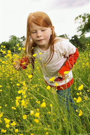 simsearch:600-03692097,k - Girl Looking at Wildflowers in Field Stock Photo - Premium Royalty-Free, Code: 600-01100067