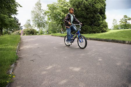 simsearch:600-01100083,k - Boy on Bicycle Stock Photo - Premium Royalty-Free, Code: 600-01100106