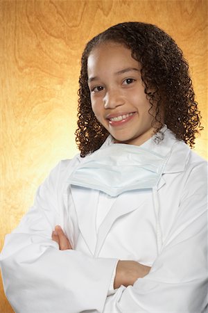 Young Girl Dressed as Doctor Stock Photo - Premium Royalty-Free, Code: 600-01119954