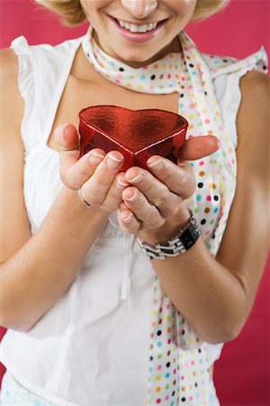 simsearch:600-03768654,k - Woman Holding Heart-Shaped Box Stock Photo - Premium Royalty-Free, Code: 600-01111230