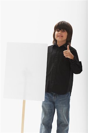 simsearch:700-00047115,k - Portrait of Boy Holding Sign Stock Photo - Premium Royalty-Free, Code: 600-01112017