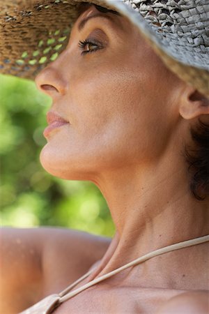 Woman in Sunhat Stock Photo - Premium Royalty-Free, Code: 600-01112773