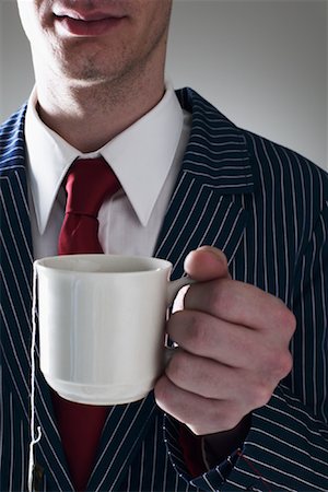 Man Holding Cup of Tea Stock Photo - Premium Royalty-Free, Code: 600-01112855