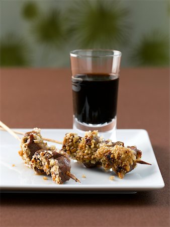 simsearch:600-02912202,k - Pork Skewers with Peanuts and Red Wine Stock Photo - Premium Royalty-Free, Code: 600-01112850