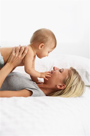 simsearch:600-01172751,k - Mother Playing with Baby Stock Photo - Premium Royalty-Free, Code: 600-01112877