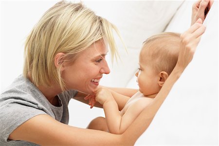 simsearch:700-00557270,k - Mother Playing with Baby Stock Photo - Premium Royalty-Free, Code: 600-01112879