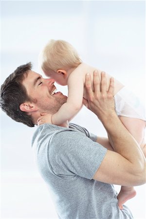 simsearch:700-06758135,k - Father Playing with Baby Stock Photo - Premium Royalty-Free, Code: 600-01112889