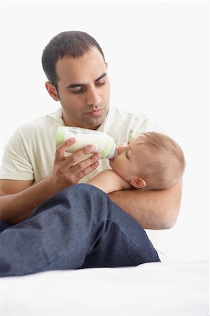 simsearch:600-01112884,k - Father Feeding Baby Stock Photo - Premium Royalty-Free, Code: 600-01112881