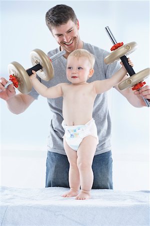 simsearch:600-01112884,k - Father and Son Playing with Weights Stock Photo - Premium Royalty-Free, Code: 600-01112890