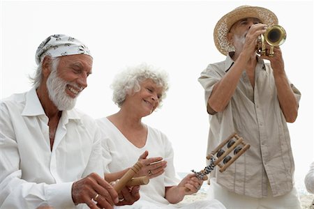 People Playing Music on Beach Stock Photo - Premium Royalty-Free, Code: 600-01112912