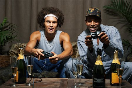 Friends Playing Video Game Stock Photo - Premium Royalty-Free, Code: 600-01124700