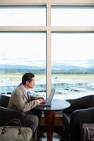 Businessman Using Laptop, Vancouver, British Columbia, Canada Stock Photo - Premium Royalty-Free, Code: 600-01124856