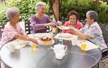 Women Eating Cake Stock Photo - Premium Royalty-Free, Code: 600-01120273